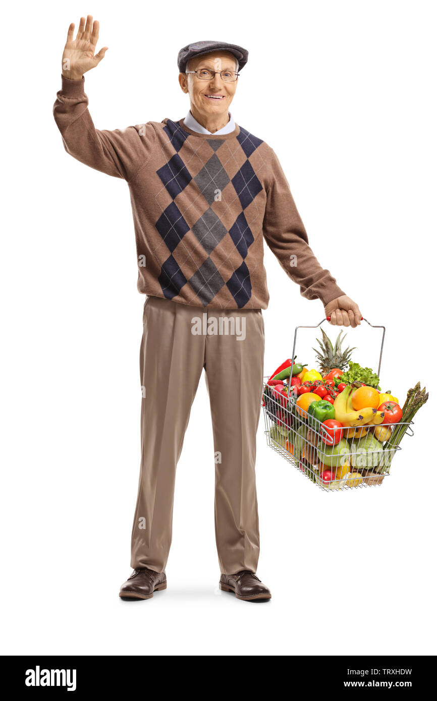 Portrait d'un homme portant un panier et en agitant à l'appareil isolé sur fond blanc Banque D'Images