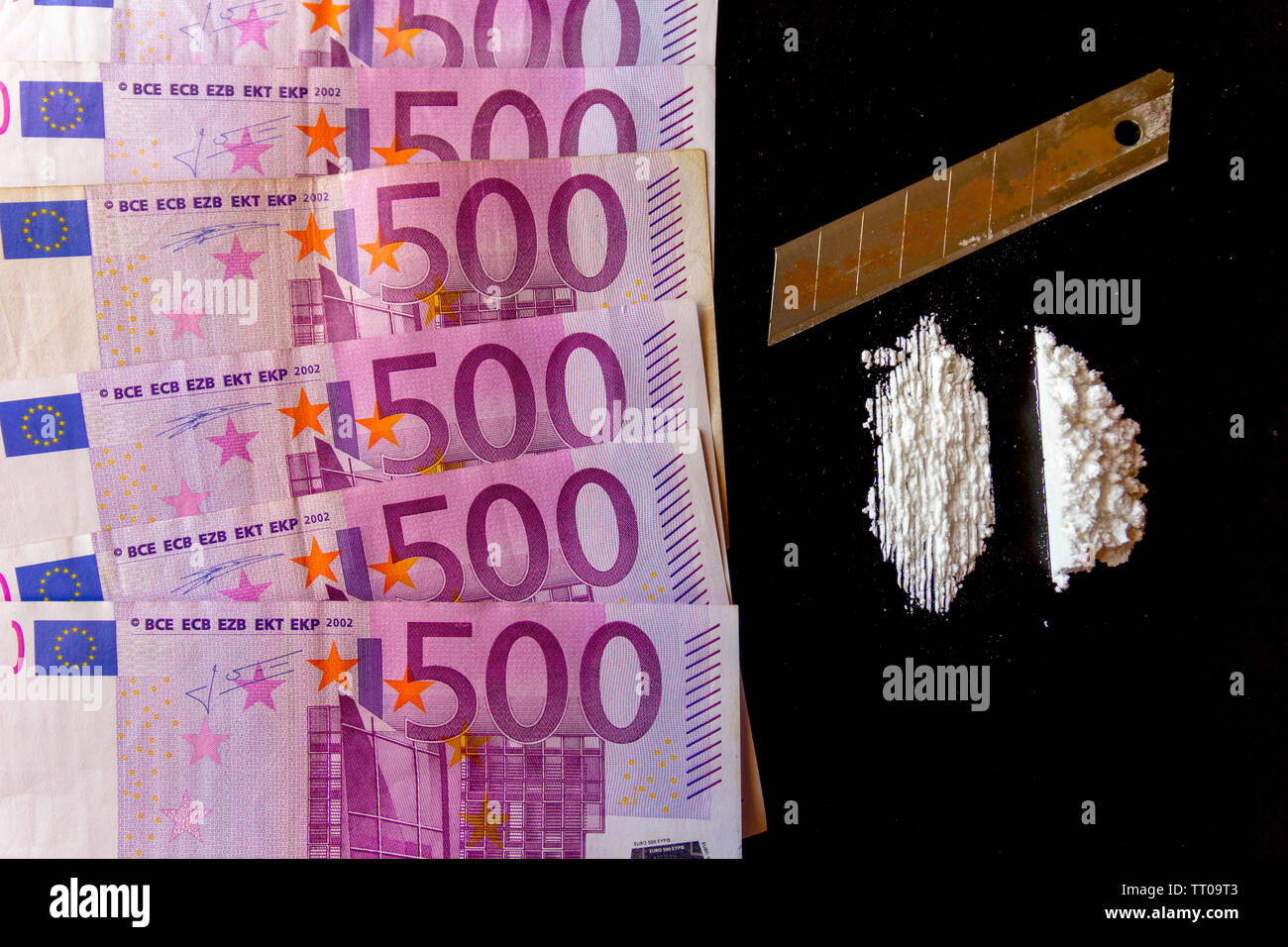 Couper les drogues et d'argent Banque D'Images