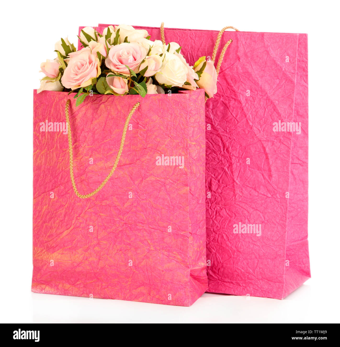 Des sacs colorés et des fleurs, isolated on white Banque D'Images