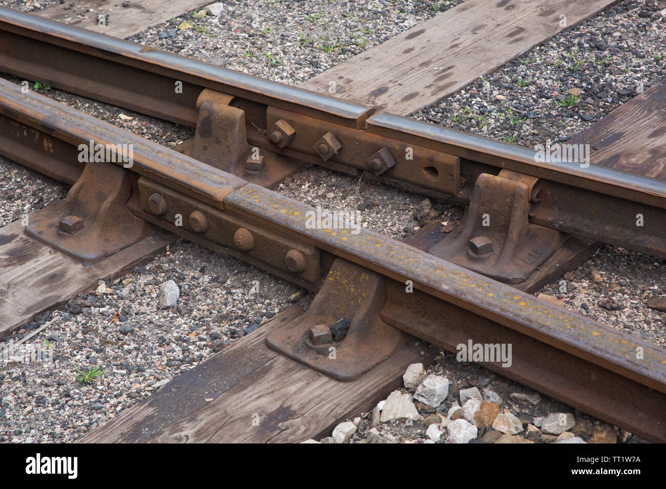 Libre de liens entre la voie de chemin de fer en acier laminés à chaud en sections et attaches, sacs et de ballast à Didcot Railway Centre, Oxfordshire, UK Banque D'Images