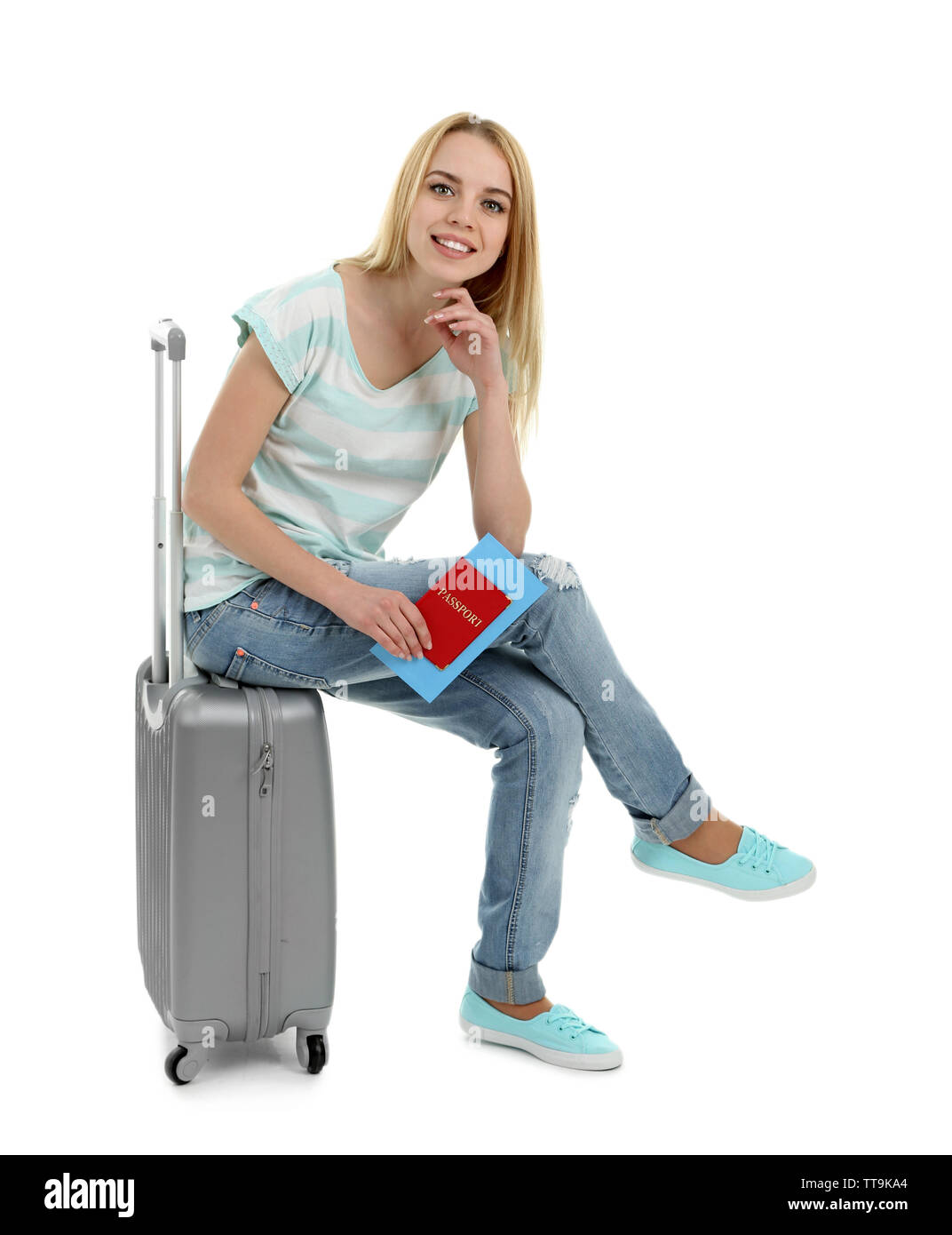 Woman holding suitcase, isolated on white Banque D'Images