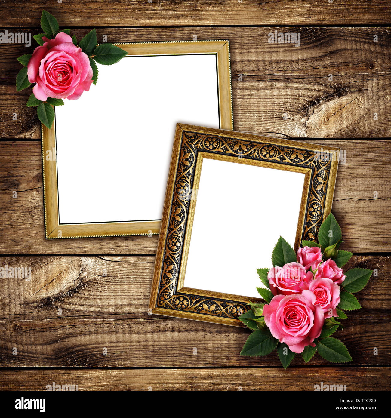 Arrangement de fleurs rose rose sur les cadres pour photo ou texte sur fond de bois brun Banque D'Images