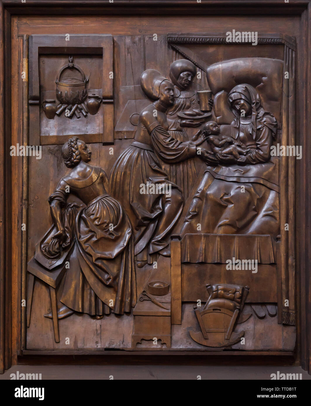 La Nativité de la Vierge Marie représentée dans le tilleul d'allégement sculpté par le sculpteur allemand Veit Stoss (Veit Stoß) sur l'aile gauche de l'autel de la Nativité (Veit-Stoß-autel) dans la Cathédrale de Bamberg (Bamberger Dom) à Bamberg, Haute-Franconie, Allemagne. Banque D'Images
