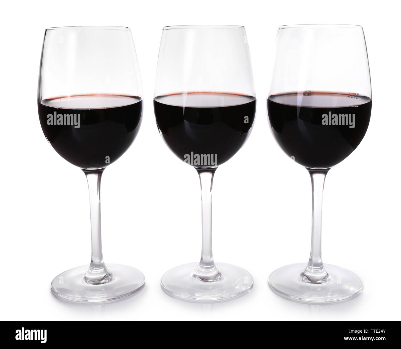 Trois verres de vin rouge sur fond clair Banque D'Images