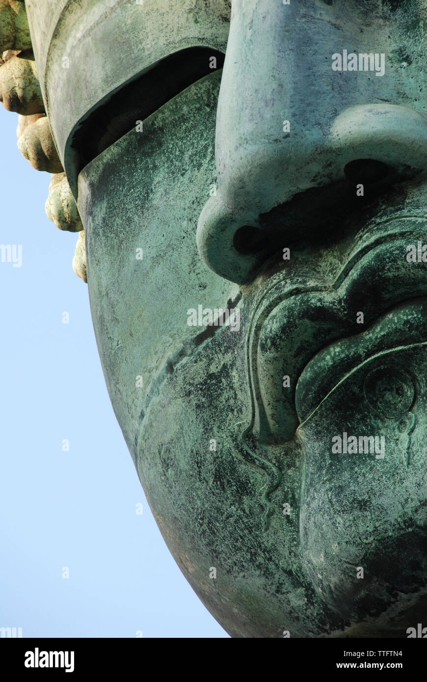 Close-up of statue Bouddha Géant contre le ciel Banque D'Images