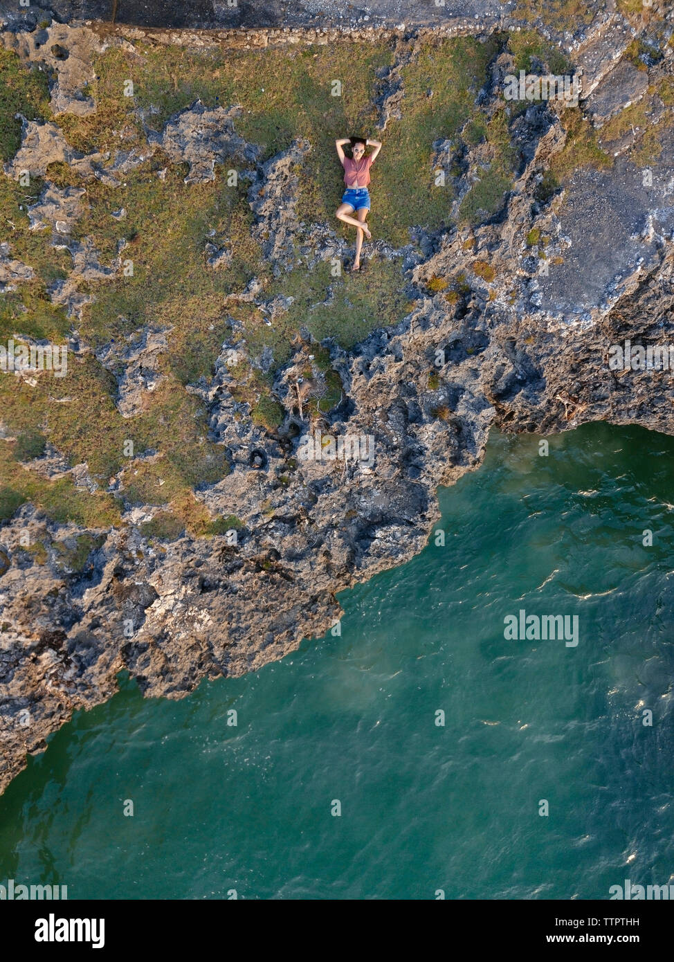 High angle view of woman lying at beach Banque D'Images