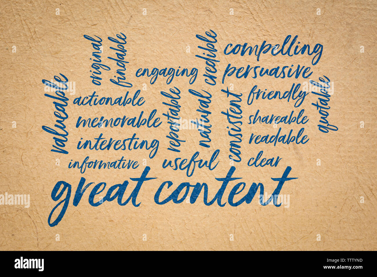 Grand contenu word cloud - handwirting sur un papier d'écorce à la main Banque D'Images