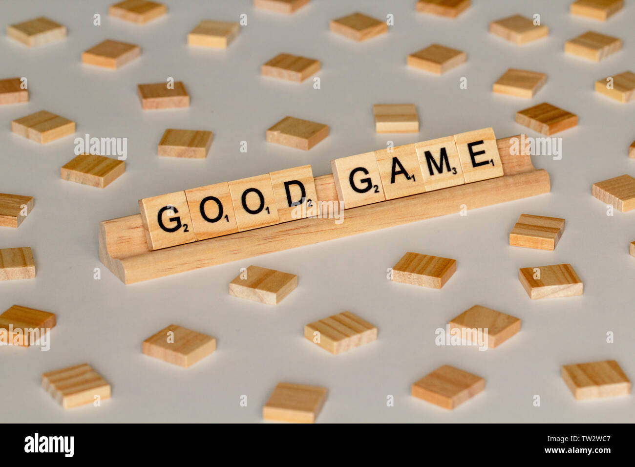 Jeu de mots Scrabble carreaux bois 'orthographe bon jeu' Banque D'Images