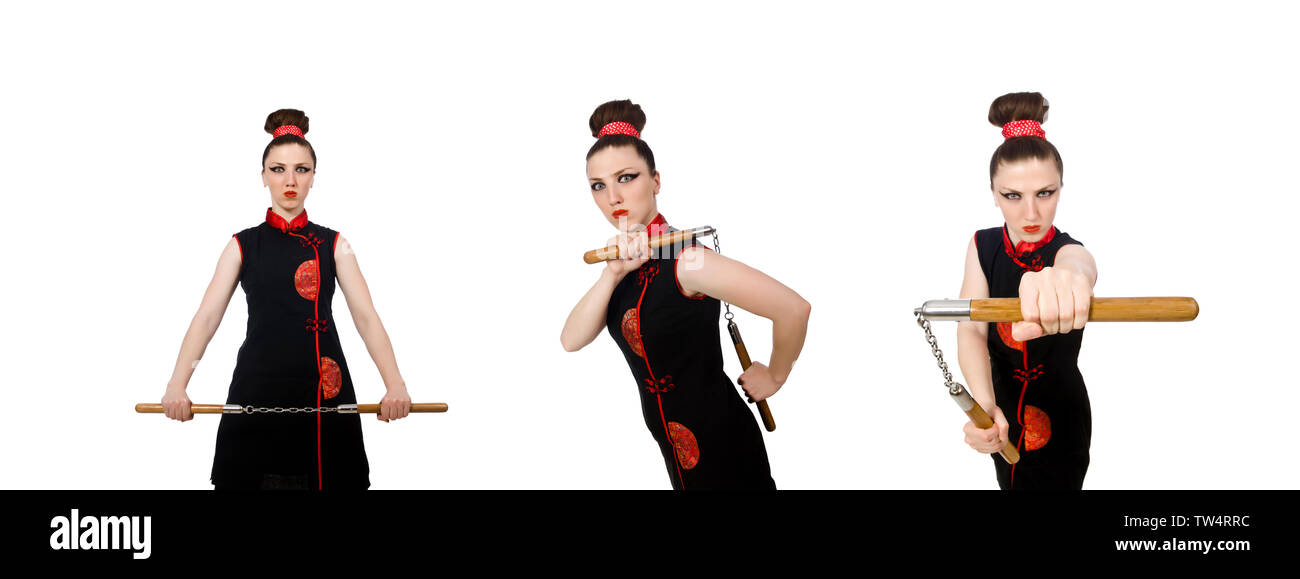 Femme drôle avec nunchucks isolated on white Banque D'Images