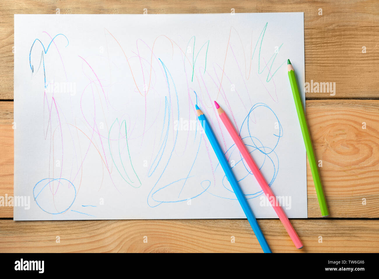 Colorful abstract dessin d'enfant sur fond de bois Banque D'Images
