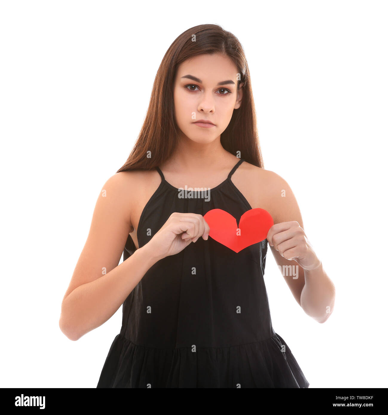 Femme malheureuse déchirure papier sur fond blanc. Liquidation concept Banque D'Images