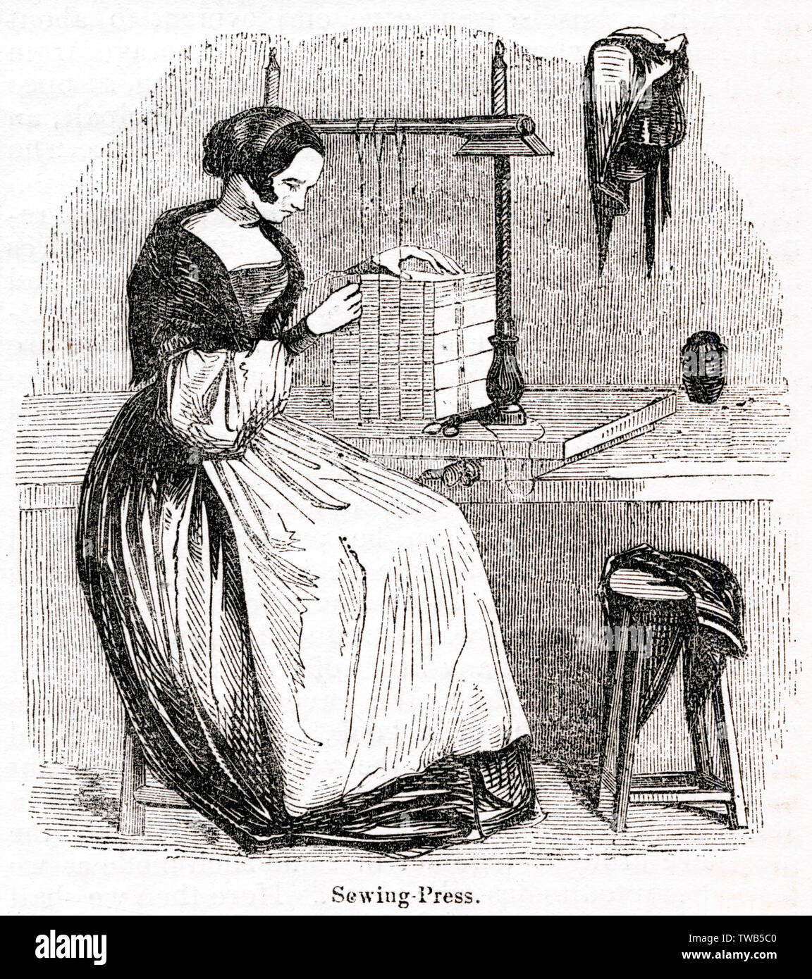 Scène dans un atelier de reliure, City of London Banque D'Images