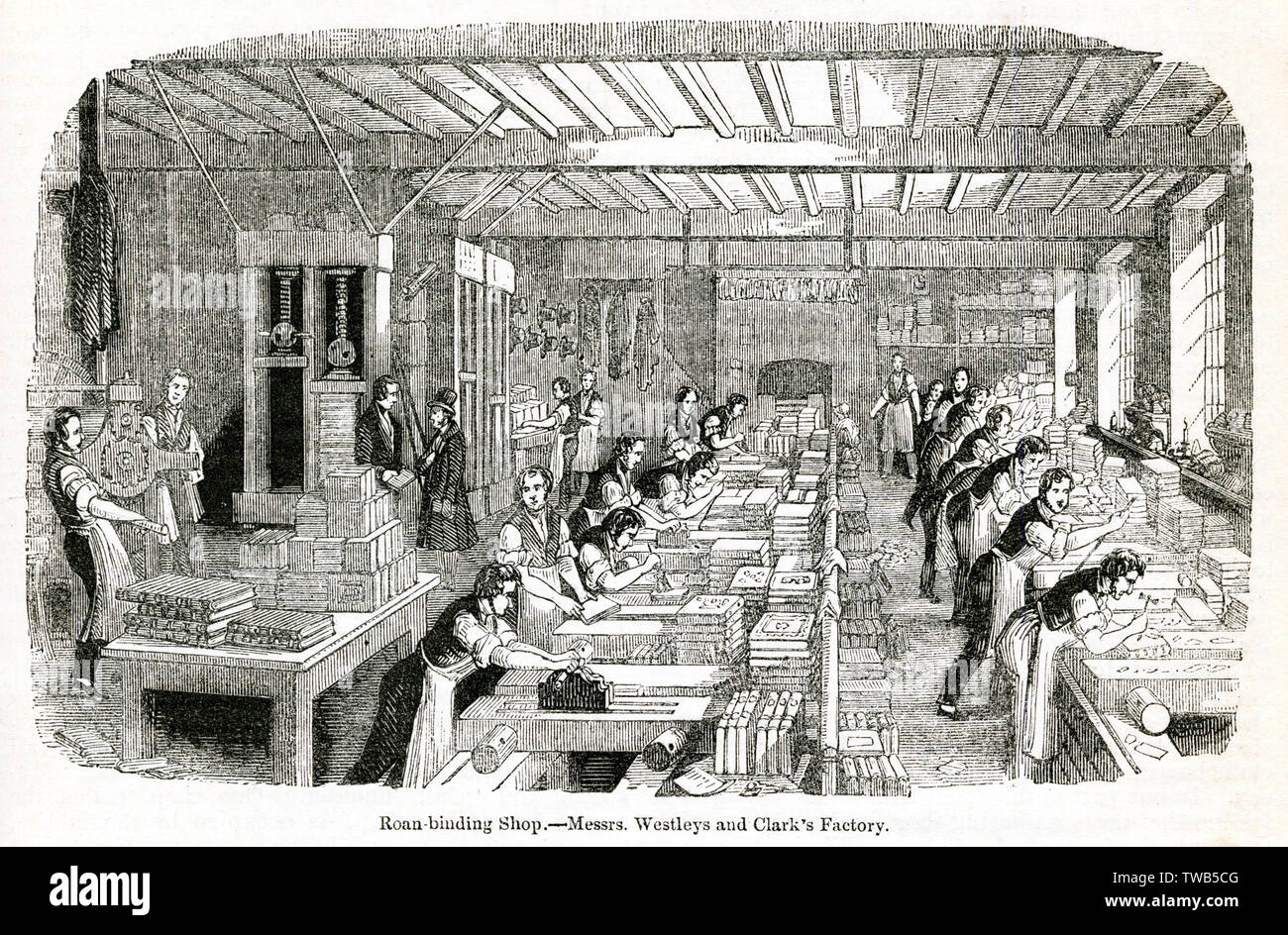 Scène dans un atelier de reliure, City of London Banque D'Images