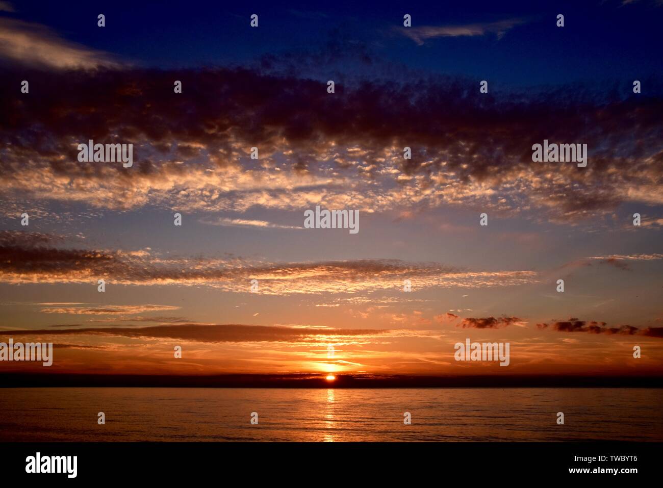 Coucher de soleil plage Weybourne à Norfolk. Banque D'Images