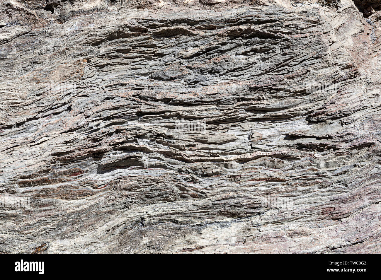 La texture de la pierre naturelle. Texture naturelle des roches de surface, où vous pouvez voir les lignes dessinées dans le long du temps. Peut être utilisé comme arrière-plan. Banque D'Images