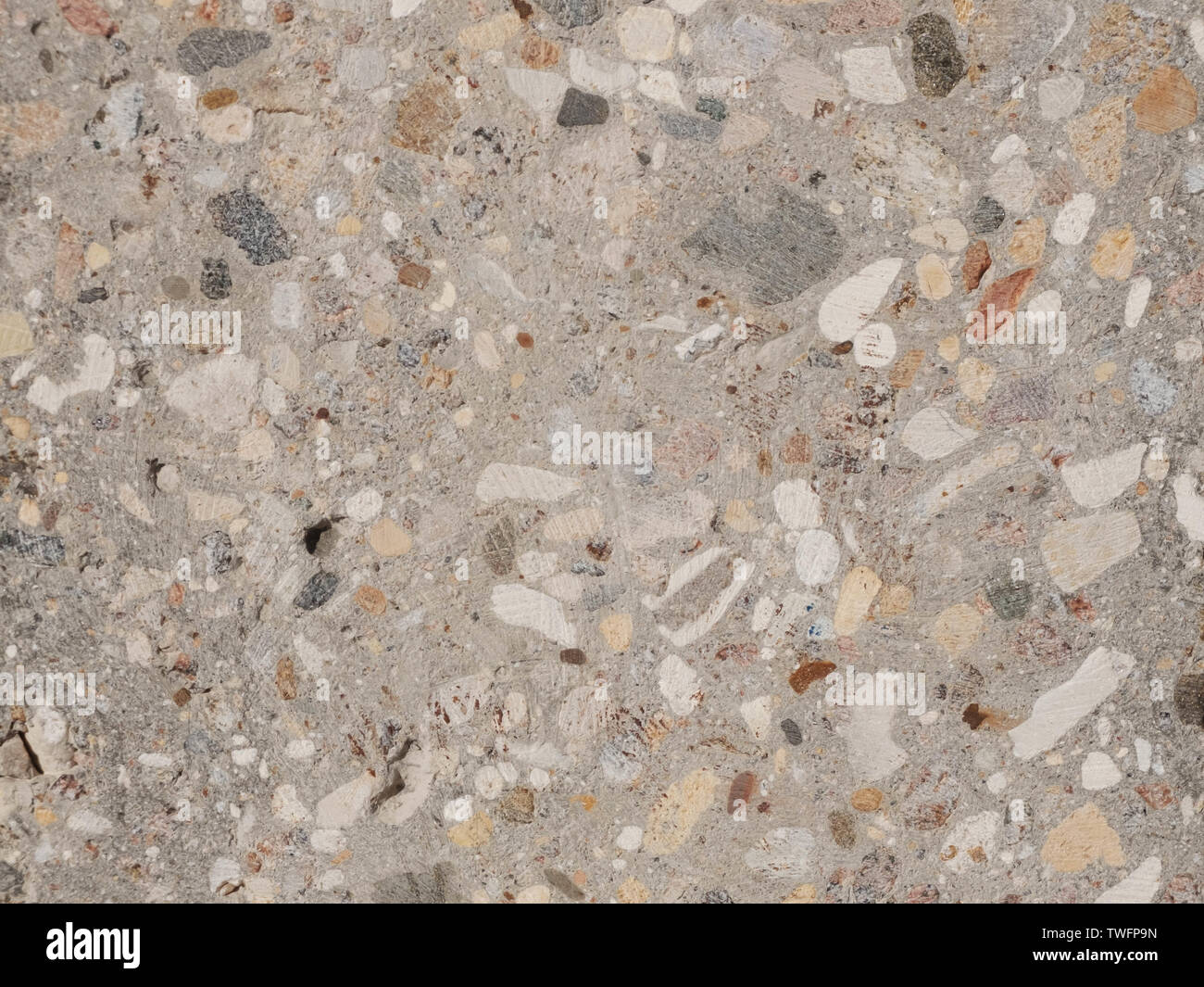 La texture du béton broyé avec des cailloux Banque D'Images