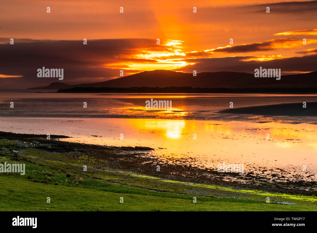 Lever du soleil sur le Loch Gruinart à partir de la péninsule Ardnave Banque D'Images