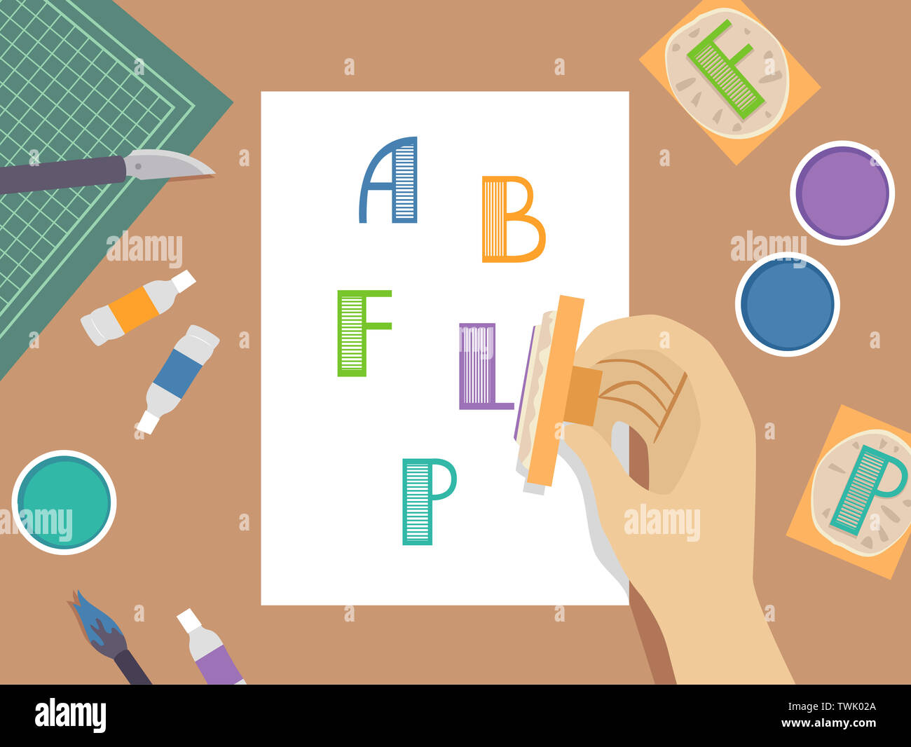 Illustration d'une main tenant un tampon encreur lettre sur le papier avec des encres de couleur sur la table Banque D'Images