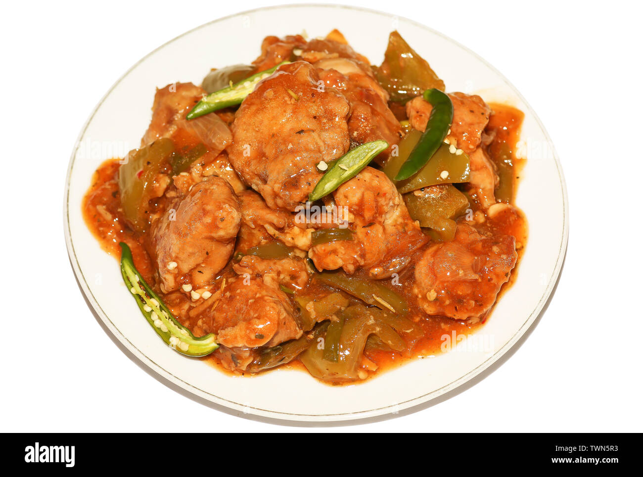 La nourriture indienne épicée préparée avec du poulet en sauce servi avec sauce au piment vert. Poulet au Chili est un plat populaire en Chine servi avec riz frit Banque D'Images