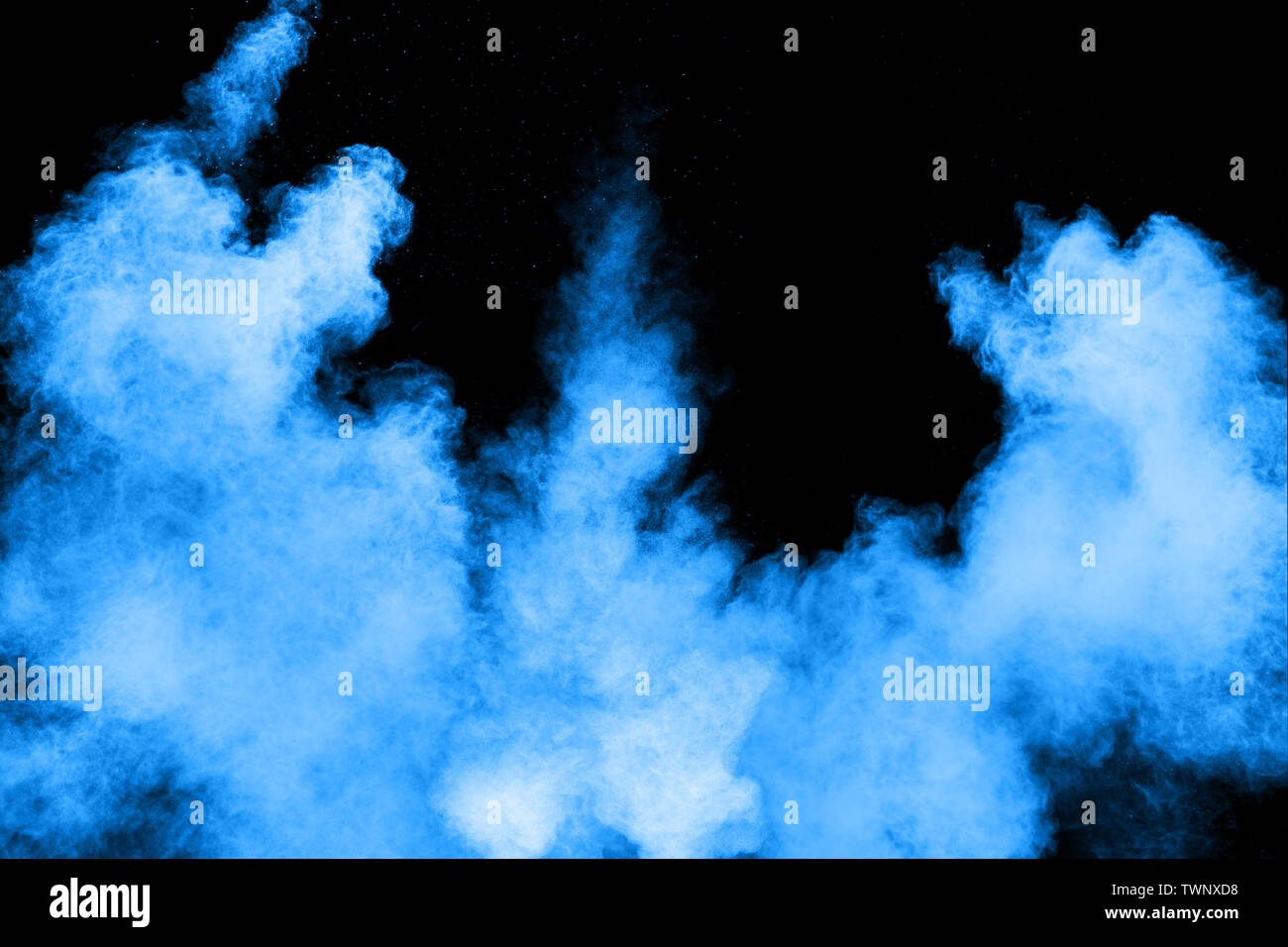 Résumé d'explosion de poussière multicolore sur fond noir. Poudre de couleurs abstraites splash sur fond sombre. Banque D'Images