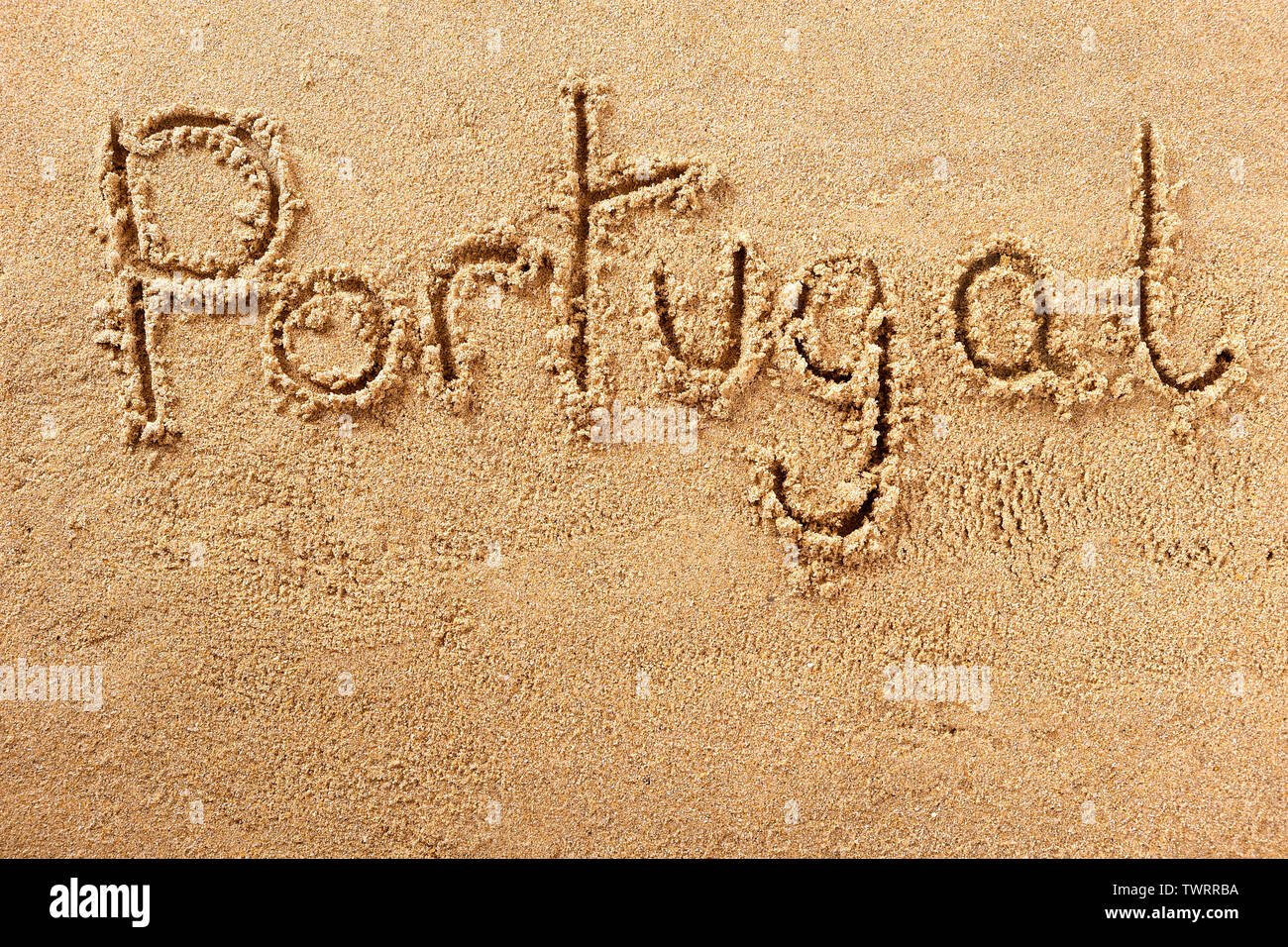 Portugal algarve beach mot écrit dans le sable Banque D'Images