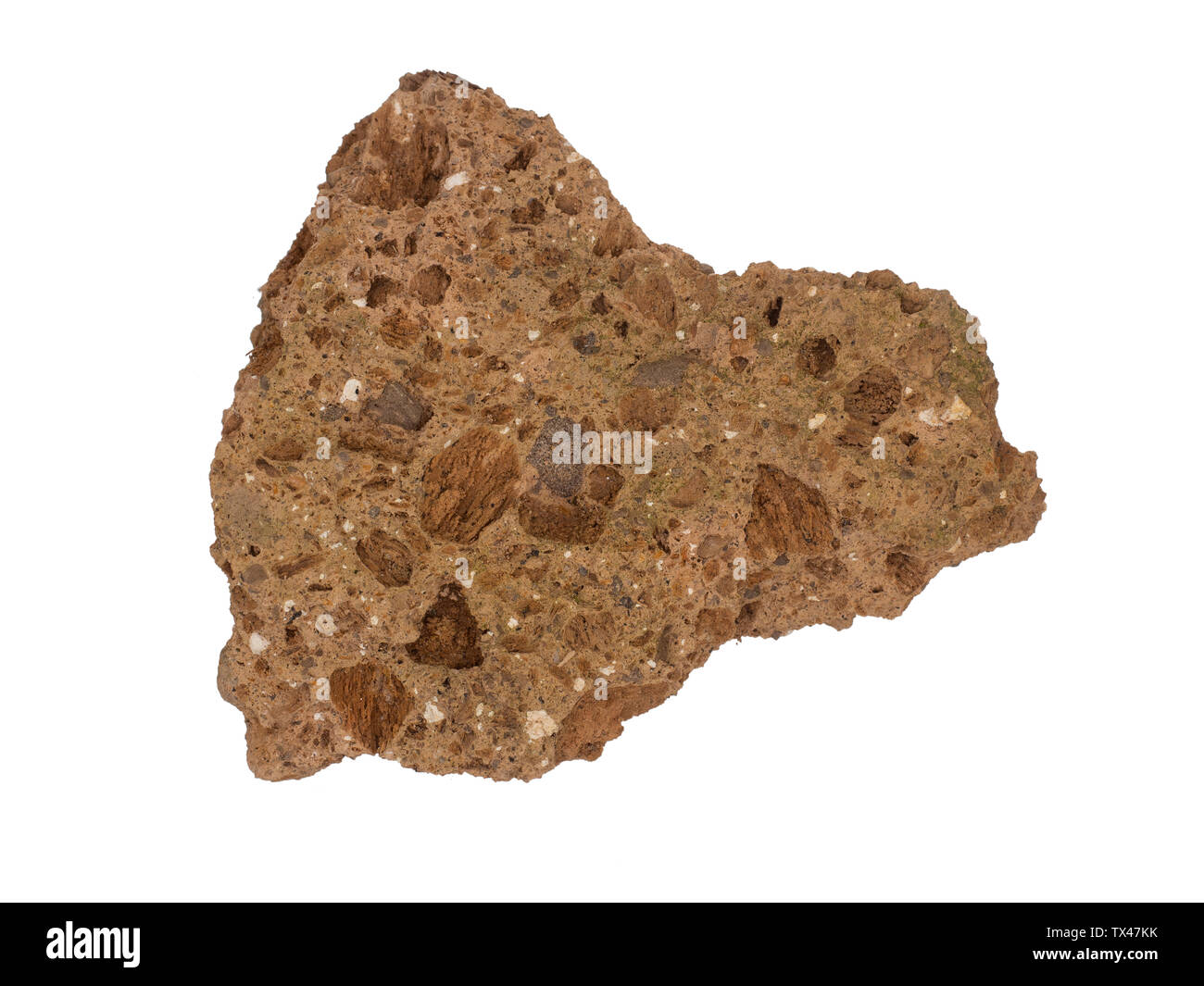 La roche de tuf volcanique, l'échantillon isolé sur blanc. Banque D'Images