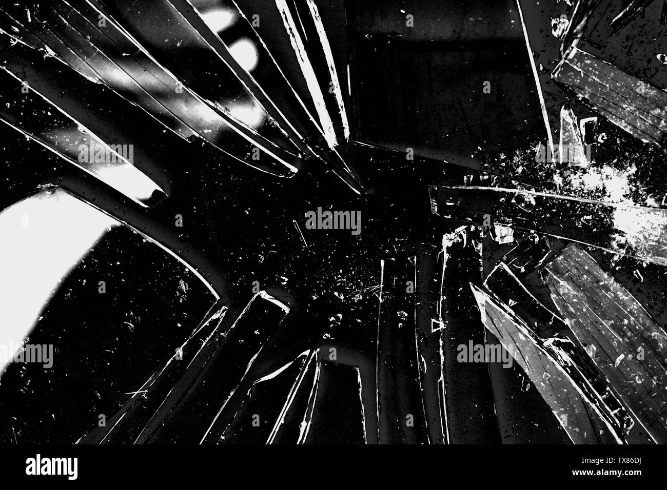 Broken Glass texture background en noir et blanc avec de nombreux éléments et pièces brisées. Stock photo style utile pour des papiers peints, des bannières ou de cop Banque D'Images