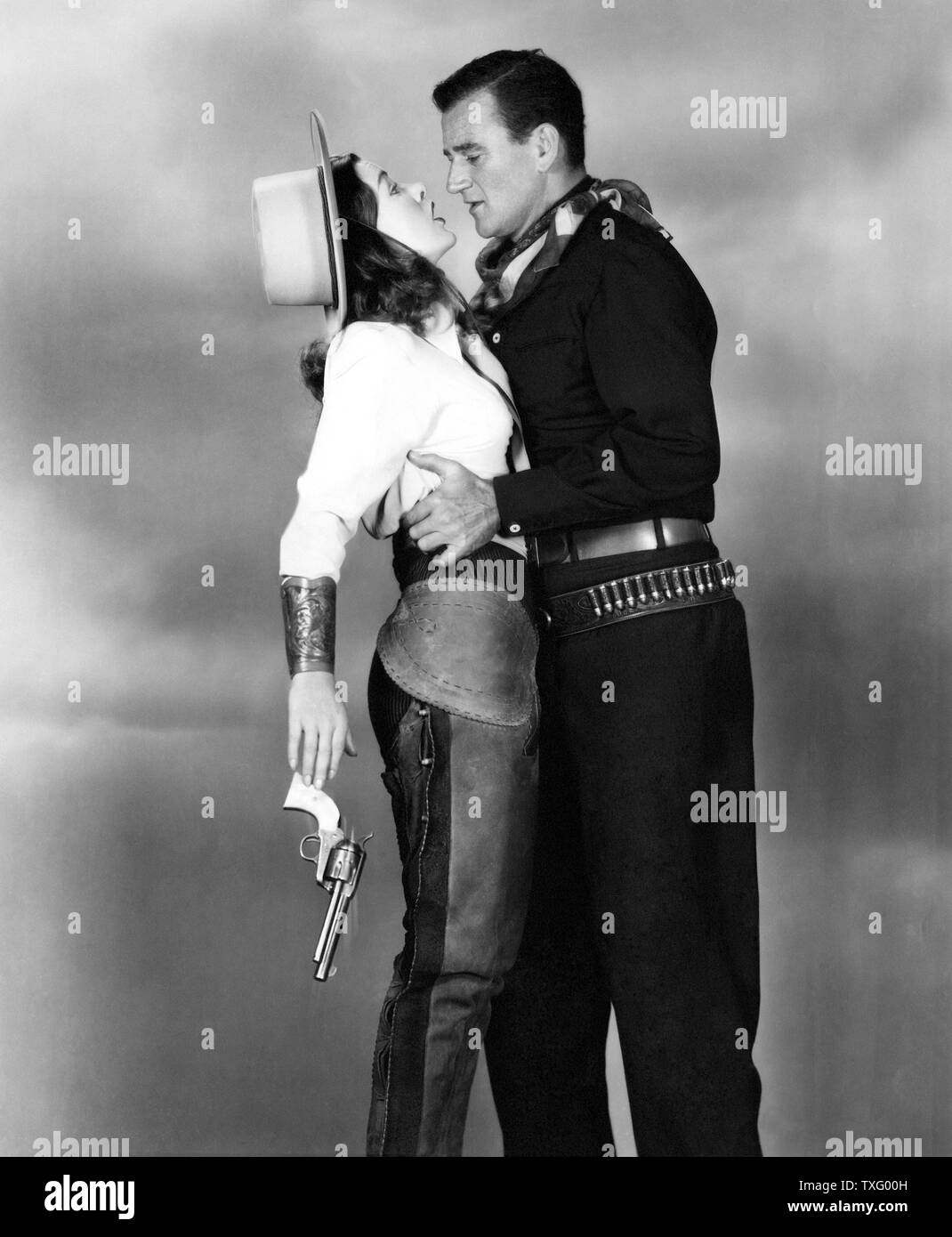 Tall dans la Selle Année : 1944 USA Réalisateur : Edwin L. Marin John Wayne, Ella Raines Banque D'Images