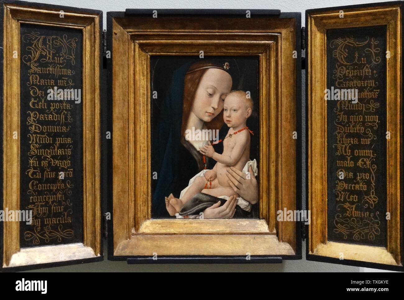 La peinture intitulée "Vierge et l'enfant" par un suiveur de Hugo van der Goes. En date du 15e siècle Banque D'Images