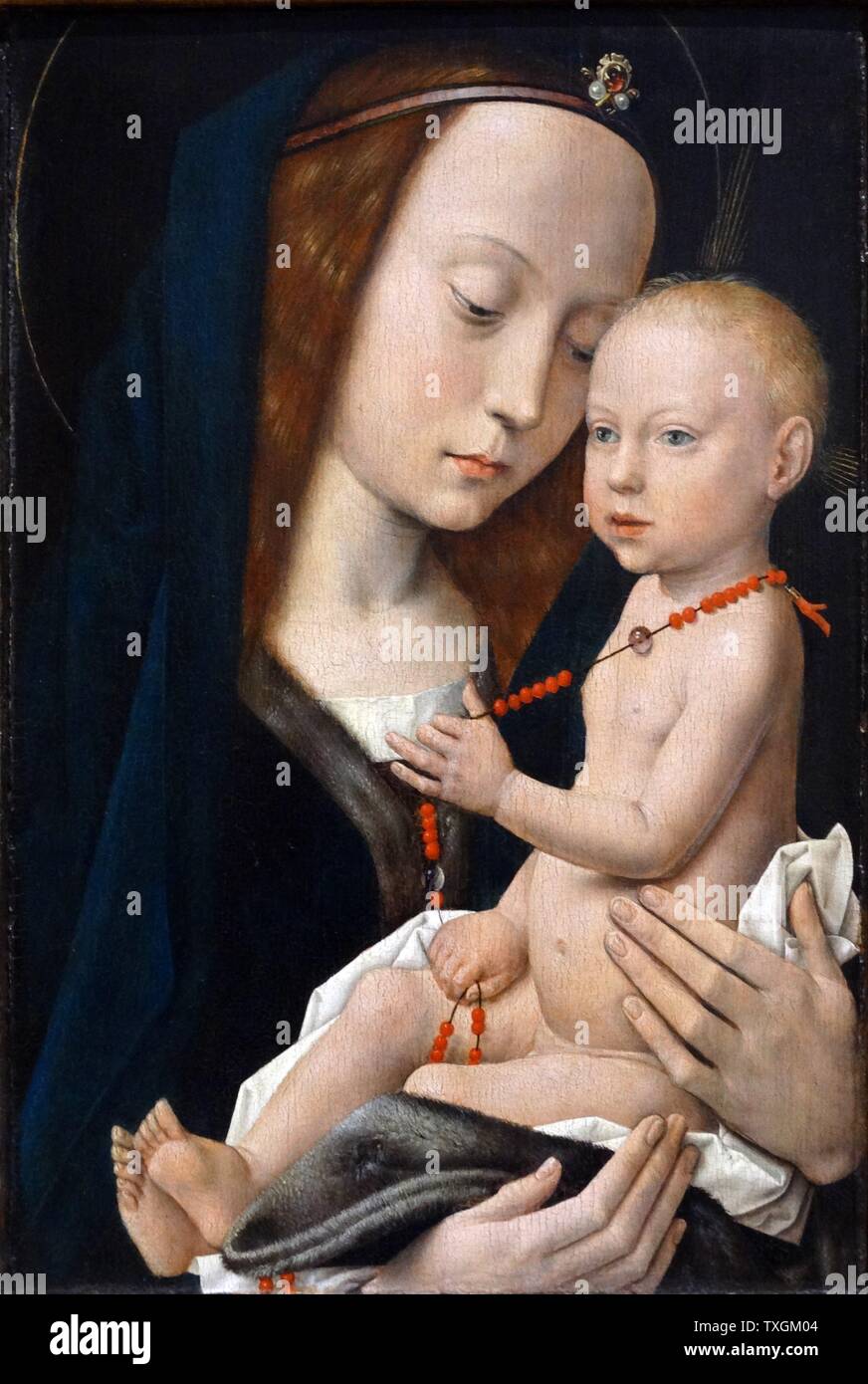 La peinture intitulée "Vierge et l'enfant" par un suiveur de Hugo van der Goes. En date du 15e siècle Banque D'Images