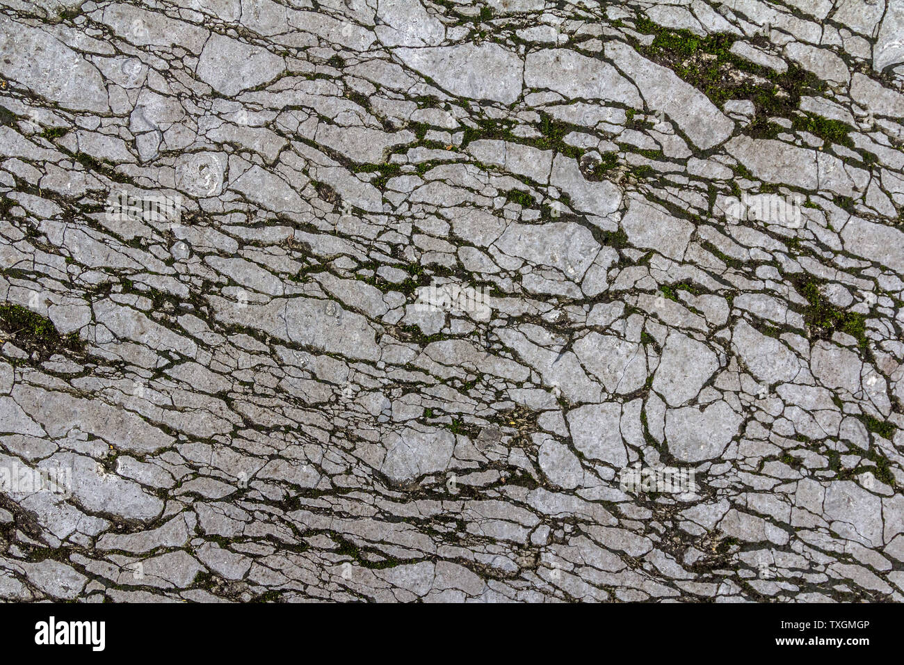 Carreaux de marbre concassé de texture. Creviced fond de granit. En résumé motif en pierre. La texture de la surface d'antiquités Banque D'Images