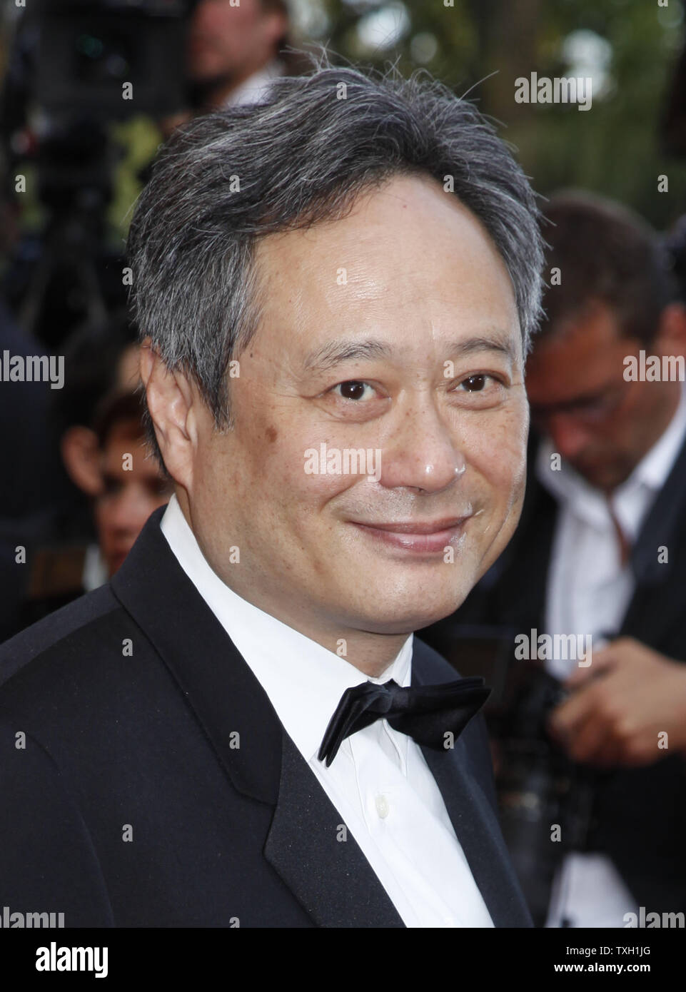 Réalisateur Ang Lee arrive sur le tapis rouge avant la projection du film "Inglourious Basterds" au 62e Festival du Film de Cannes (France) le 20 mai 2009. (Photo d'UPI/David Silpa) Banque D'Images