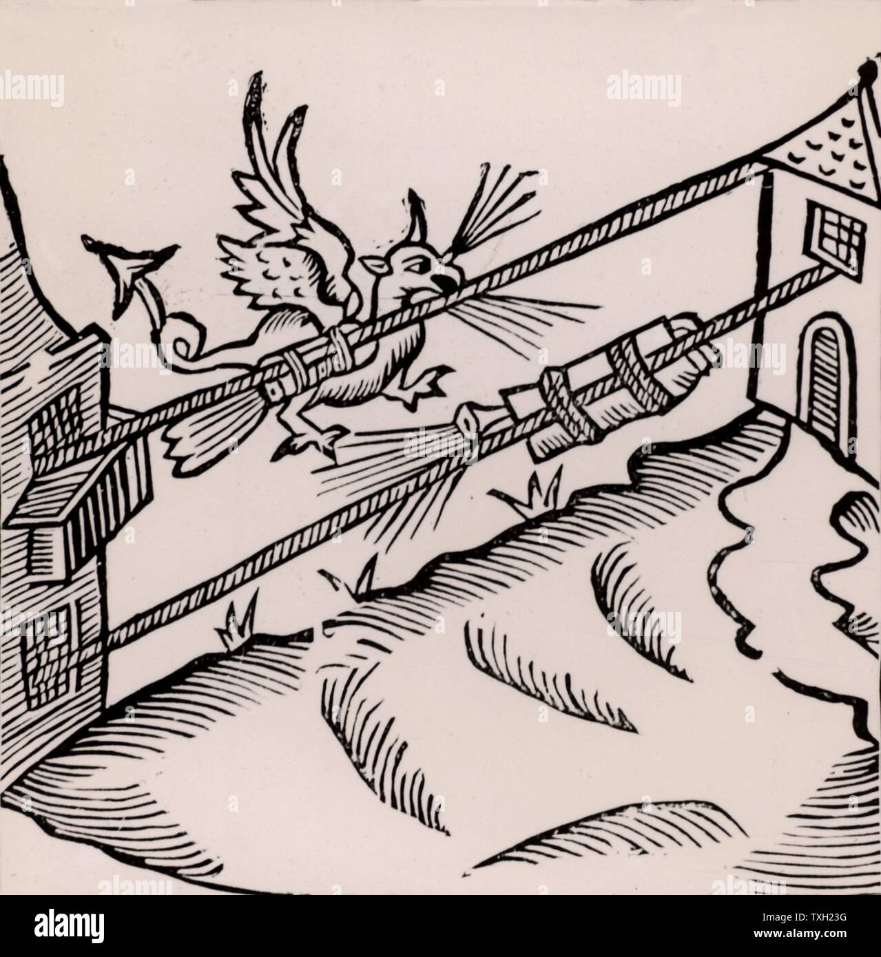 Un feu d'artifice : La figure d'un dragon de feu de respiration est fixé à une fusée à une corde tendue entre deux bâtiments. Gravure sur bois de 'récréations mathematiques' par Jean Leurechon (Rouen, 1628). Banque D'Images