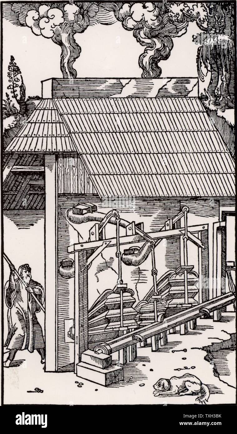 Soufflets actionnés par un arbre à cames, la fourniture d'un projet de fusion. 'De De re metallica', par Agricola, pseudonyme de Georg Bauer (Bâle, 1556). Gravure sur bois. Banque D'Images