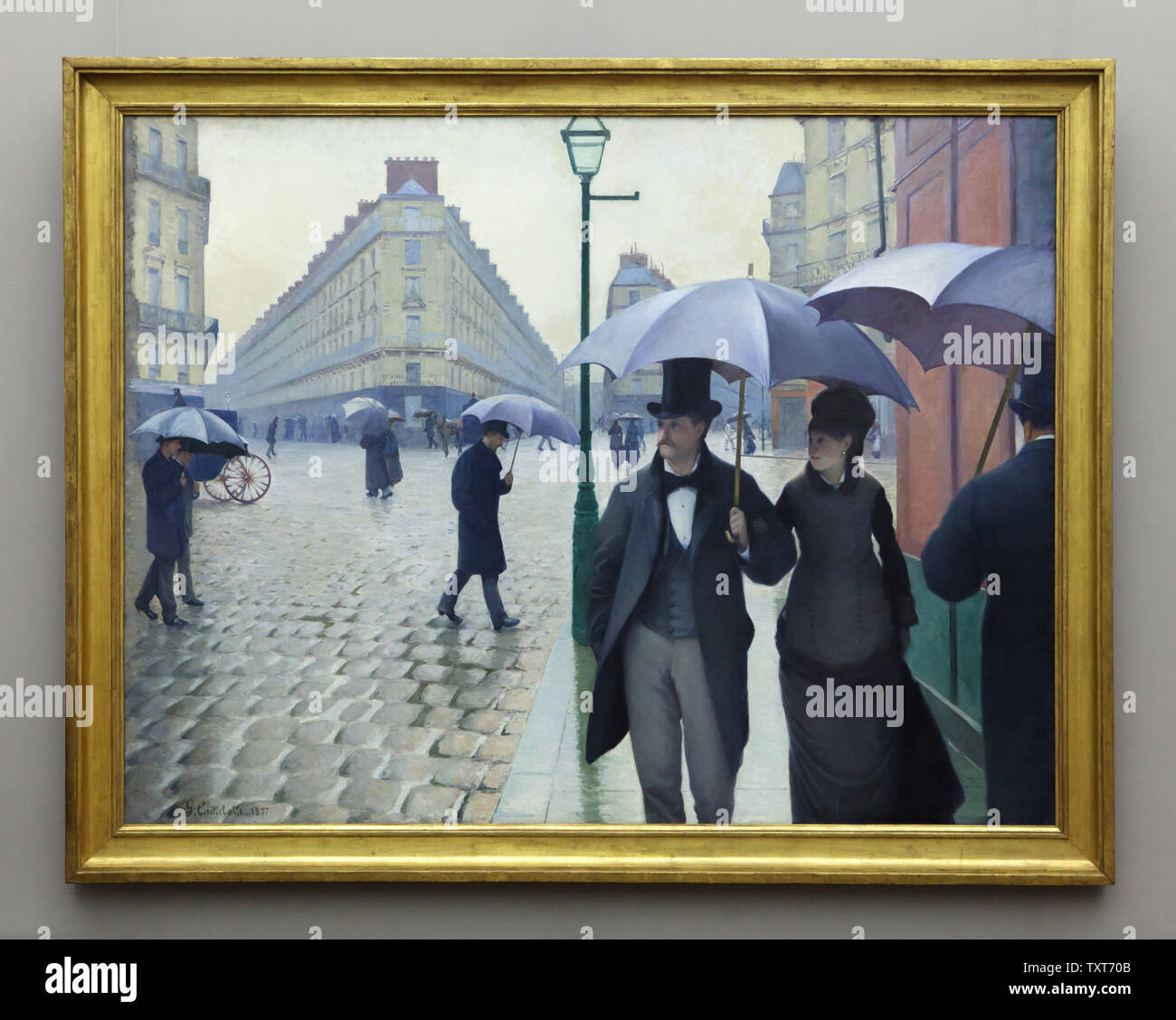 Peinture 'Rue de Paris. Jour de pluie' par le peintre impressionniste Gustave Caillebotte (1877) sur l'affichage à son exposition à la Alte Nationalgalerie (ancienne Galerie Nationale) à Berlin, Allemagne. Banque D'Images