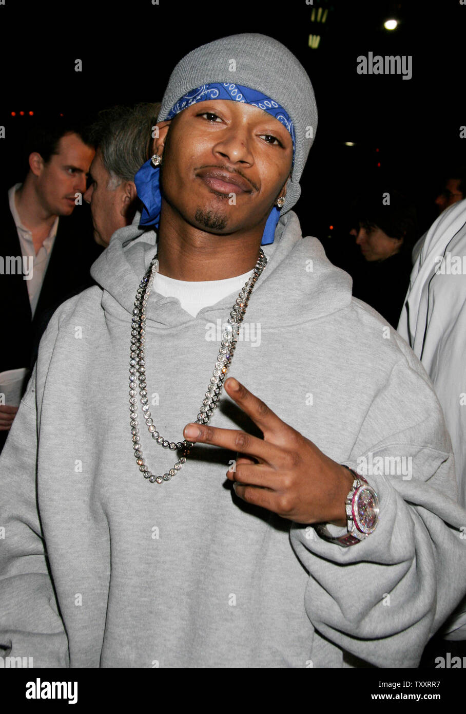 L'artiste d'enregistrement Chingy arrive au 13 janvier 2005, Los Angeles première du film Coach Carter, '', au Grauman's Chinese Theatre. Le film est basé sur une histoire vraie de l'Entraîneur Ken Carter, l'un de ceux de qui l'ensemble de son équipe de basket-ball de l'Invaincu pour le faible rendement scolaire. (Photo d'UPI/Francis Specker) Banque D'Images