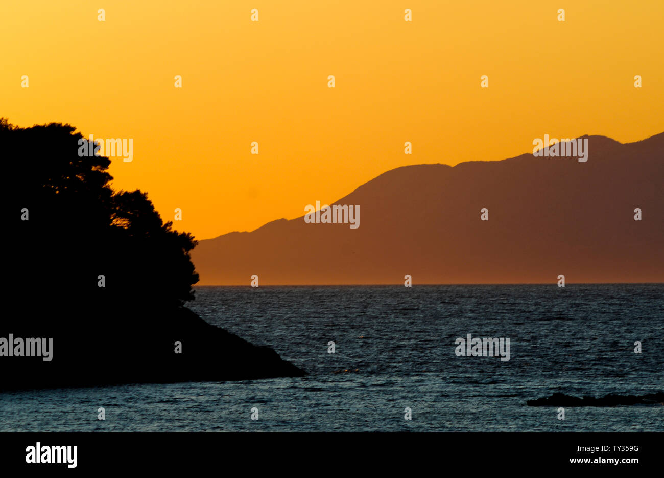 Coucher de soleil dans la mer Adriatique, Croatie Banque D'Images