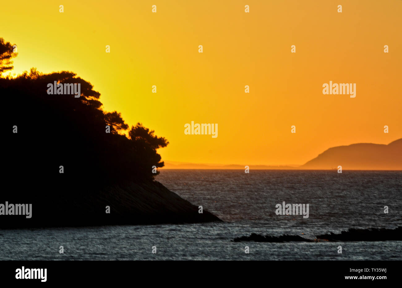 Coucher de soleil dans la mer Adriatique, Croatie Banque D'Images
