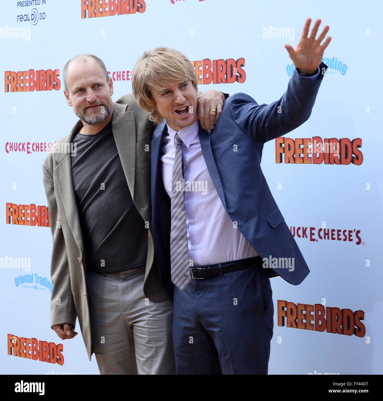 Acteurs Woody Harrelson (L), la voix de Jake et Owen Wilson, la voix de