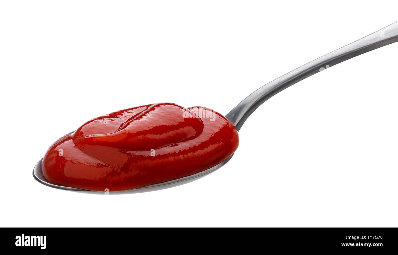 Cuillère en ketchup isolé sur fond blanc Banque D'Images