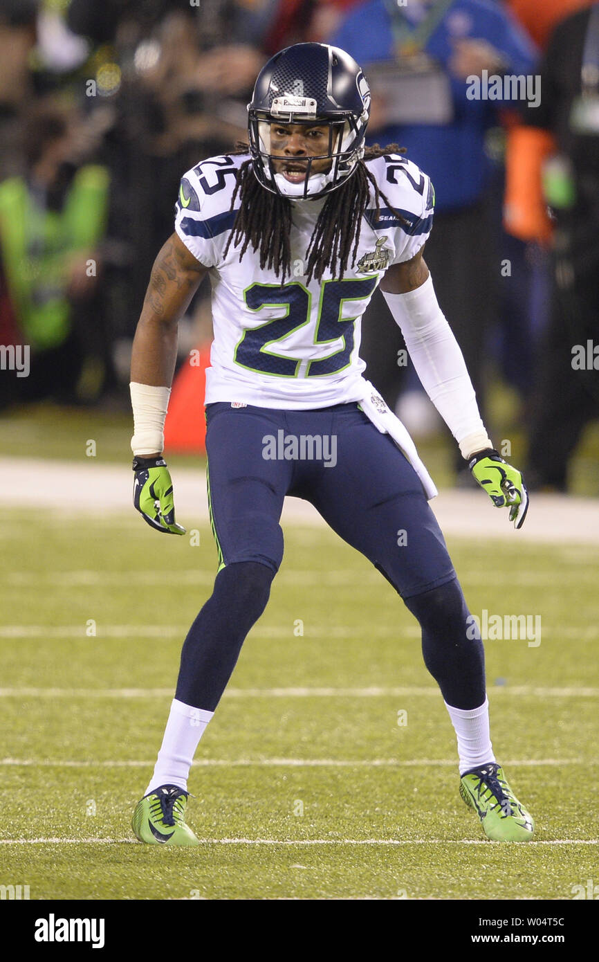 Seattle Seahawks Richard évoluait Sherman (25) en action contre les Broncos de Denver au Super Bowl XLVIII MetLife Stadium à East Rutherford, New Jersey le 2 février 2014. Stade MetLife héberge la première piscine de la NFL Super Bowl par temps froid. UPI/Riche Kane Banque D'Images Seattle Seahawks Richard évoluait Sherman (25) en action contre les Broncos de Denver au Super Bowl XLVIII MetLife Stadium à East Rutherford, New Jersey le 2 février 2014. Stade MetLife héberge la première piscine de la NFL Super Bowl par temps froid. UPI/Riche Kane Banque D'Images
