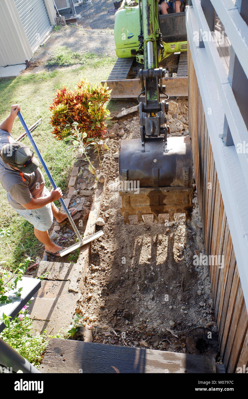 Au travail acharné de l'excavateur Banque D'Images