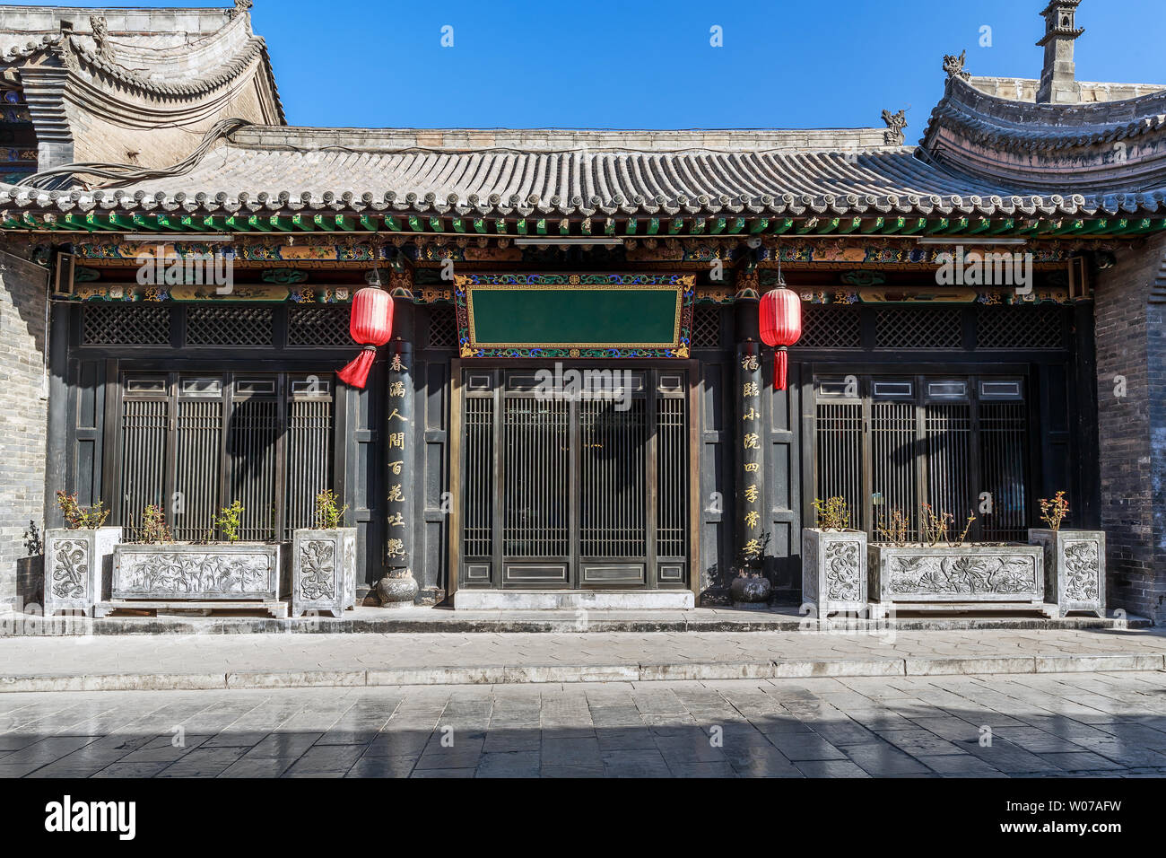 L'architecture traditionnelle chinoise sur l'ancienne rue des dynasties Ming et Qing dans la ville antique de Pingyao, dans la province du Shanxi Banque D'Images