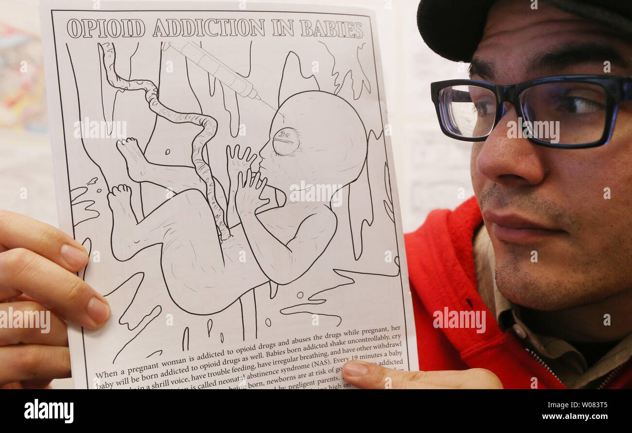 Artiste graphique Royce Banuelos affiche son travail d'un bébé à naître avec une aiguille dans sa tête qui est inclus dans le nouveau livre de coloriage intitulée 'crise d'opioïdes,' au très gros livres à colorier company dans Clayton, New York le 23 février 2018. Le nouveau livre de coloriage donne une explication simple de ce que les opioïdes sont et ce qu'ils peuvent faire pour une vie. 650 000 personnes devraient mourir de mort par surdose d'opiacés au cours des dix prochaines années. Photo de Bill Greenblatt/UPI Banque D'Images
