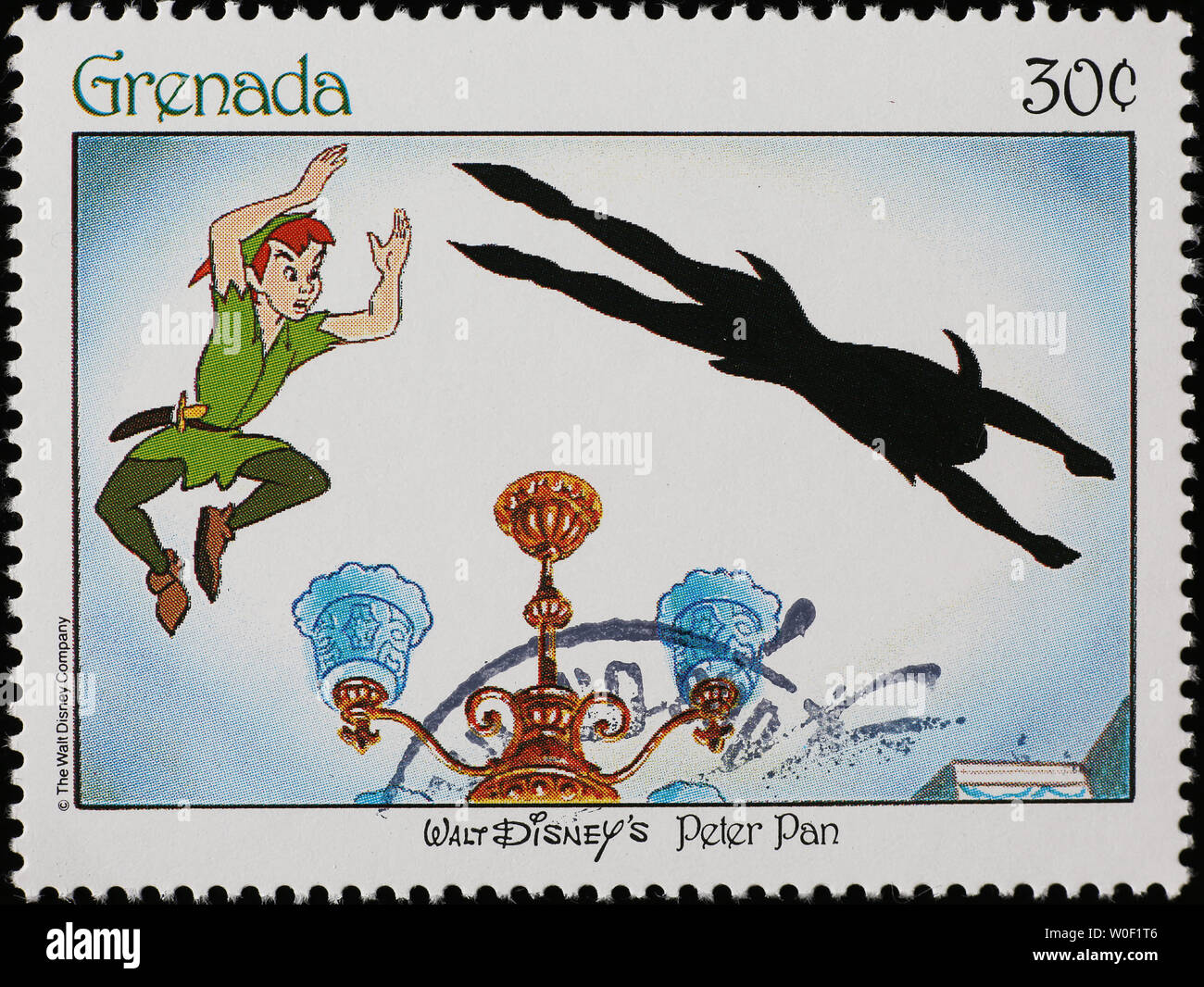 Peter Pan poursuit son ombre sur timbre-poste Banque D'Images