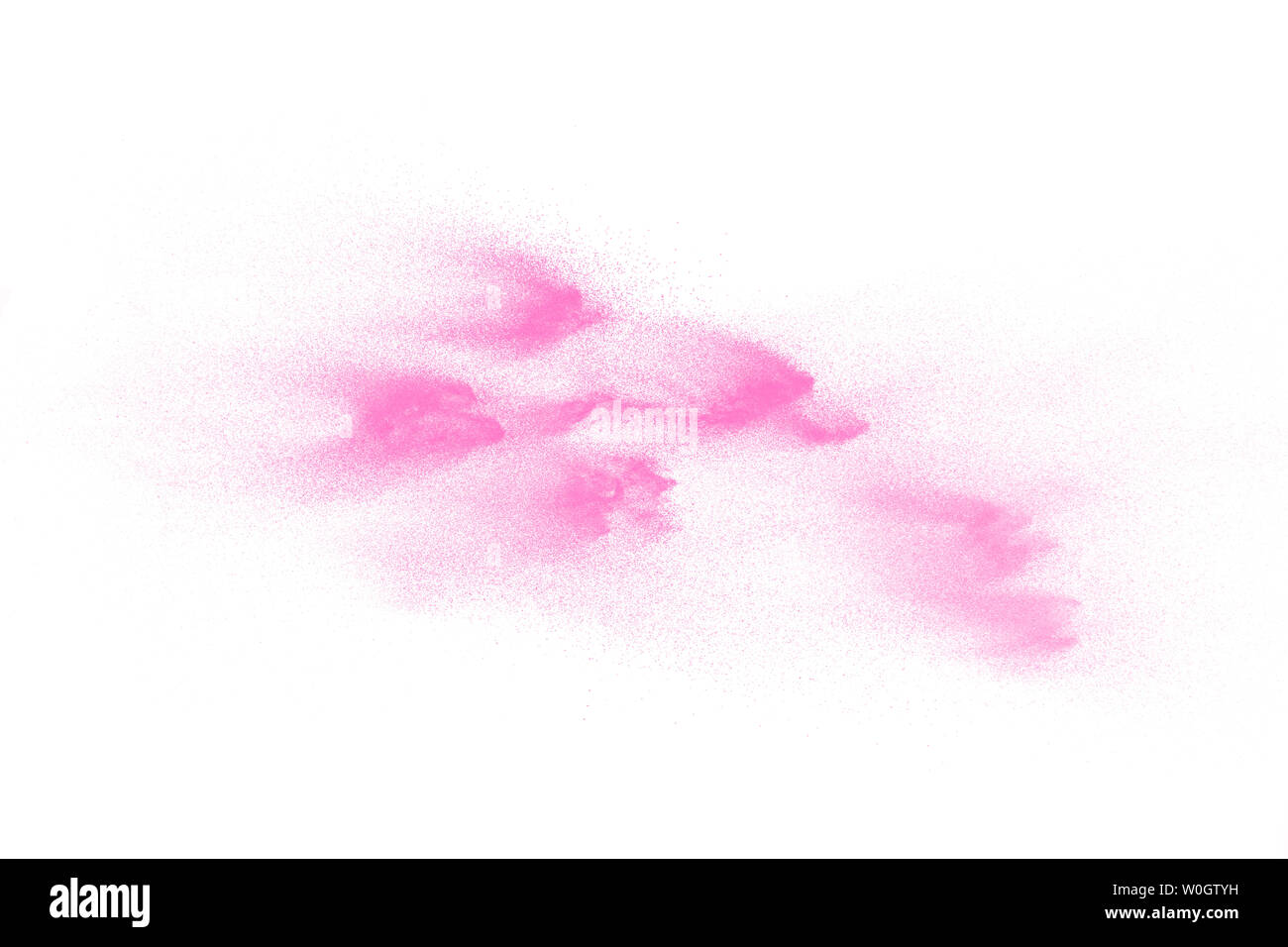 Explosion de poudre de couleur rose sur fond blanc. Banque D'Images