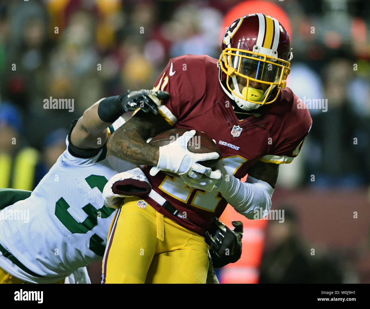 Redskins de Washington le receveur DeSean Jackson (11) présente un projet de 17 verges contre Green Bay Packers strong safety Micah Hyde (33) au premier trimestre à FedEx Field à Landover, Maryland le 20 novembre 2016. Banque D'Images