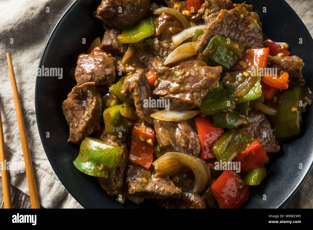 Steak au poivre chinois fait maison avec du riz blanc Banque D'Images