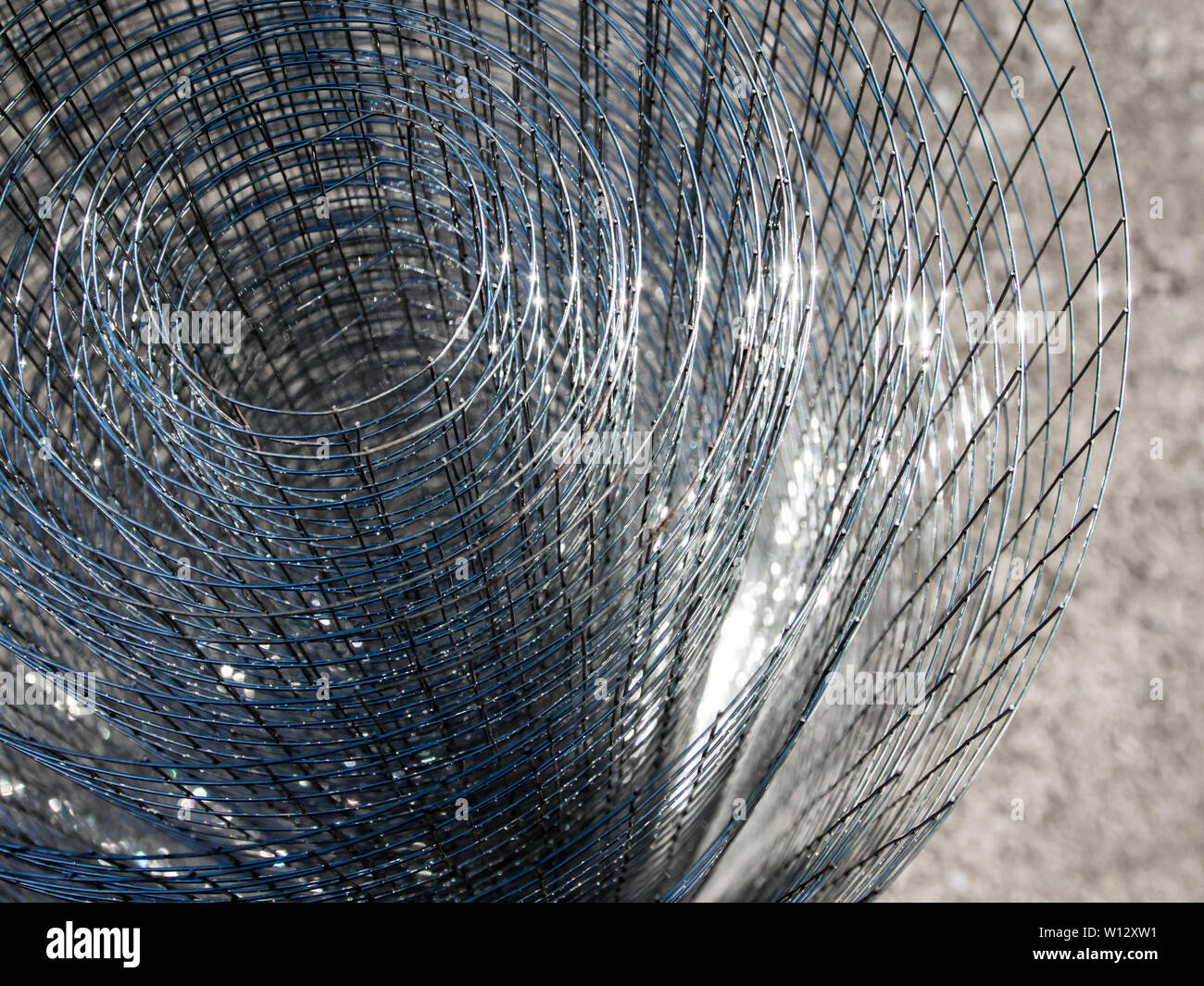 Les rouleaux en acier brillant caillebotis fil Photo Stock - Alamy