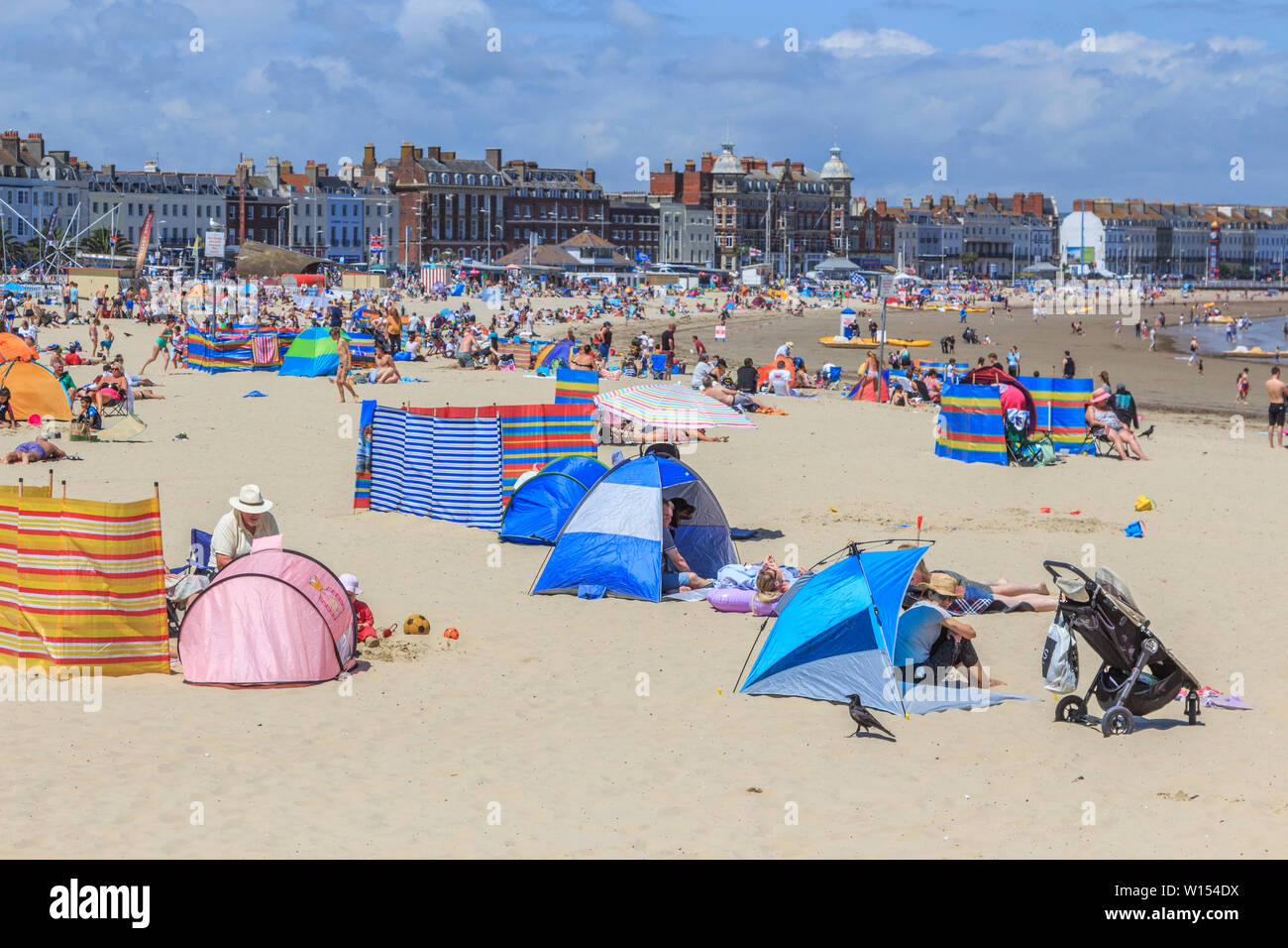 Royaume-uni jours fériés traditionnels plage,ville balnéaire géorgienne weymouth Dorset, Angleterre, uk go Banque D'Images